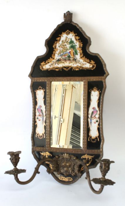 Wong Lee Porcelain - A hand painted porcelain and metal surround bevelled mirror with two