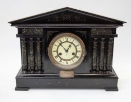 A circa 1900 Roman architectural wooden mantle clock, ebonized, 8 day with Roman numerals