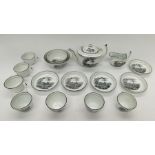 Thomas Wolfe - A circa 1810 printed tea service, including seven cups and saucers, teapot, bowl
