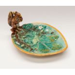 A Victorian majolica nut dish Condition: Half of left ear missing, scuffs to rim.