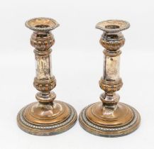 Pair of mid 19th century silver plated candlesticks.