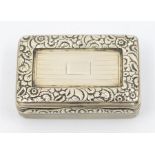 A George III silver snuff box, reeded sides, the cover chased with a foliate border, gilt