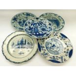 A collection of five 19th Century large circular plates/platters, each with different designs