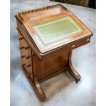 A mahogany 19th Century Davenport desk with four dummy drawers, four internal drawers, gallery