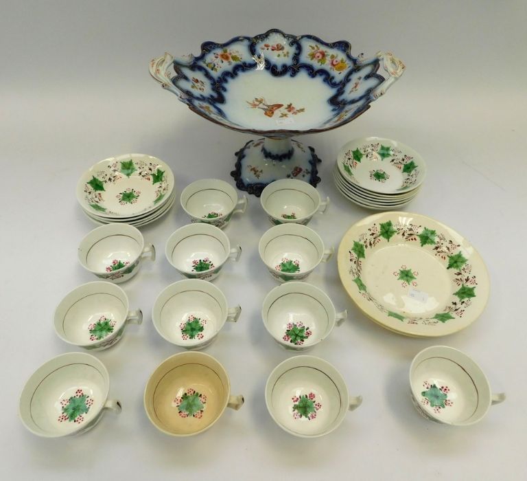 Mid 19th century porcelain tea set i.e. bowls, cups, saucers along with late 19th century tall