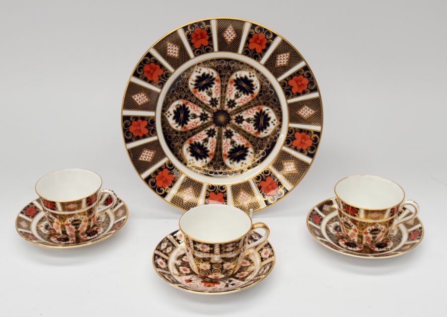 A pair of Royal Crown Derby Imari 1128 cups and saucers (second quality), together with an Old Imari