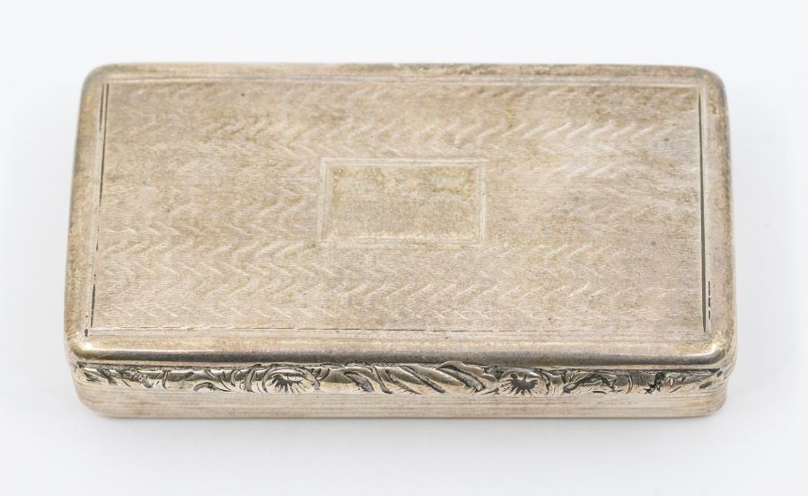 A George IV silver rectangular snuff box, engraved squiggle work and vacant cartouche to cover,