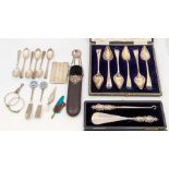 A collection of silver to include; a cased set of six George V silver grapefruit spoons, James Dixon