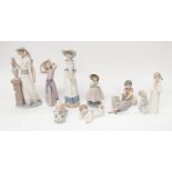 A collection of Lladro or Nao figurines to include; small young Clown, young Cherub, a few young