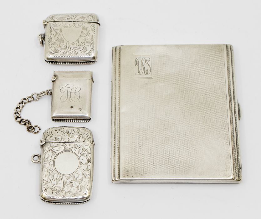 A group of silver to include; a George VI silver engine turned cigarette case, gilt interior,