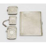 A group of silver to include; a George VI silver engine turned cigarette case, gilt interior,