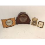 A collection of 20th Century clocks to include; a Metamec teak rectangular form, a Staiger faux