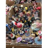 A large collection of Betty Boop figures, all in different dress.