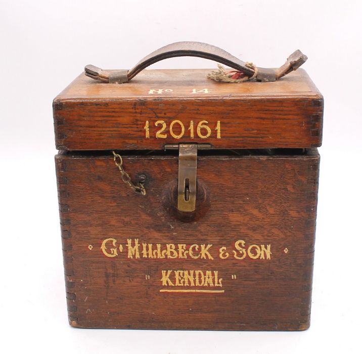 An early 20th Century Pigeon Timing Clock, in oak case, G Hillbeck & Son of Kendal