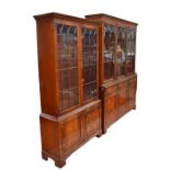 Two reproduction glazed front George III mahogany display/book cabinets: two door and three door