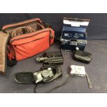 Canon 514XL video camera, Samsung and Panoramic cameras in carry cases with accessories.