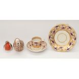 An early 19th century Derby Bloor china trio including plate, saucer and coffee can. Together with