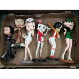 A collection of six Betty Boop figures