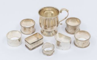 A collection of silver to include; a Queen Elizabeth II silver handled christening mug, Adie Bros,