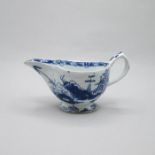 A Bow porcelain blue and white small sauce boat, painted with ‘The Desirable Residence’ pattern