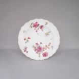 A Chelsea Brown Anchor Botanical plate, painted with flowers and sprigs  Date: Circa 1760 - Brown