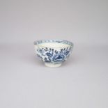 A Lowestoft Blue and White Tea Bowl, painted with floral sprays  Date: Circa 1770      Size: 8cm