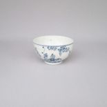 A Lowestoft Blue and White ribbed Tea Bowl. Sparsely painted with The Imortal pattern Date: Circa