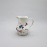 A Vauxhall Porcelain polychrome sparrow beak jug. Painted with red and blue flowers. Date: Circa