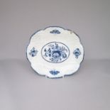 A Bow Blue and White ozier moulded tureen stand, painted with flowers and butterflies Date: Circa