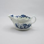 A Worcester porcelain blue and white  relief moulded small sauce boat, painted with ‘The two porters