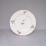 Chelsea Red Anchor Plate moulded relief painted with floral sprays and a butterfly. Date: Circa 1765