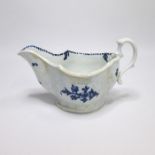 A Liverpool Blue and White Sauce Boat with a moulded body painted with flowers. Date: circa 1775