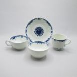 A Worcester porcelain relief moulded blue and white tea bowl, saucer, teacup and coffee cup,