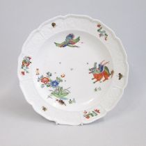 A Meissen plate, the rim moulded with the Sulkowski-Ozier pattern and decorated in the Kakiemon