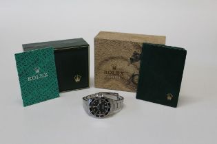 A 40mm dial Rolex submariner Oyster Perpetual date in stainless steel with original box and