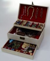 A wide variety of costume jewellery including rings, necklaces, brooches and cufflinks, all within a