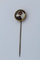 A Victorian stick pin with enamel finial of terriers portrait ' Bitters' , signed verso W B Ford and