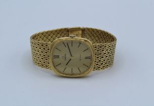 A 1970's Omega De Ville 18 carat gold wristwatch, the matching dial having Roman and baton