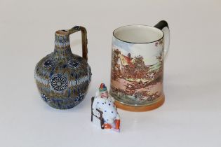 A Doulton Lambeth stoneware ewer ( at fault), together with a Royal Doulton Rustic England mug and