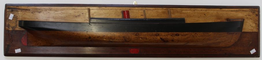 An Edwardian half hull model of a three masted steamer, Tammy II. 104cm bow to stern