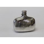 A Victorian silver hip flask with bayonet cap and engraved crest, London 1882