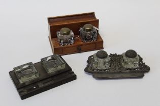 An Edwardian mahogany standish, fitted twin moulded inkwells, together with an early 20th century