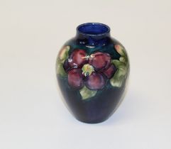 A 1950's Walter Moorcroft Clematis with buds pattern vase of ovoid form, tube line decorated with