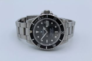 A Rolex Submariner Oyster Perpetual Date stainless steel gentleman's wristwatch 16800, circa 1988.