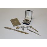 A collection of small silver items, including an engine turned cigarette case, thimble, Eversharp
