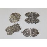 A Victorian pierced silver two piece buckle by Corke, London 1899, together with two other silver