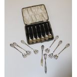 A cased set of six silver seal top teaspoons, Sheffield 1937, together with an uncased set of 830