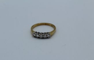 An 18k five stone diamond ring, set five brilliant cut stones, 3.1gm, total diamond weight estimated