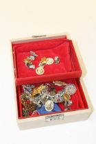 A silver ingot pendant, a marcasite set dress watch and a quantity of costume jewellery etc, in