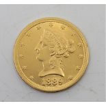 **WITHDRAWN**A replica Gold United States 1889 Liberty head $10 eagle gold coin Assessed as gold